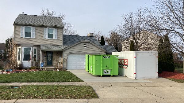 Dumpster on driveway Warren MI